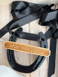 Cead Mile Failte signs , horse shoe signs